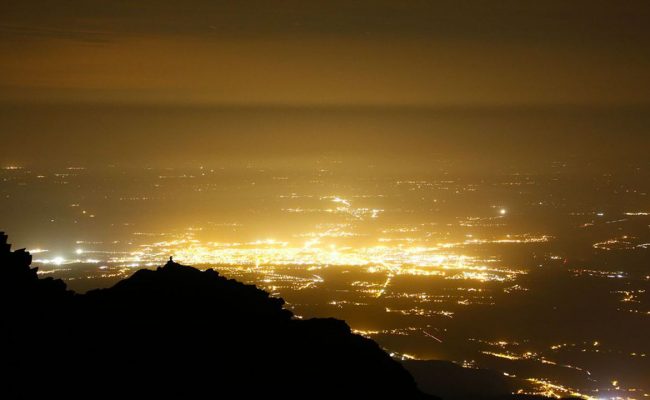 La France. Hautes Pyrénées. Pic du Midi de Bigorre Observatory. The light pollution above Tarbes.