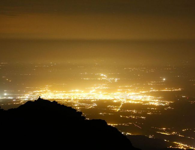 La France. Hautes Pyrénées. Pic du Midi de Bigorre Observatory. The light pollution above Tarbes.