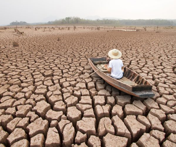 Climate,Change,,The,Man,On,Wood,Boat,At,Large,Drought